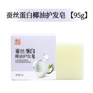 Baxne Silk Infusion Coconut Hair Shampoo Bar on a luxurious silk fabric.
